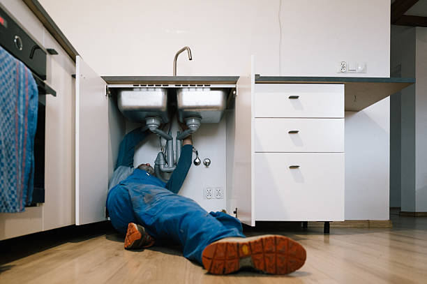 Professional Emergency Plumber technician working in Brookville, OH